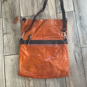 Orange leather messenger bag style handbag